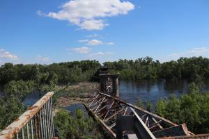 An airstrike brought down several sections of a bridge across Desna river, cutting off main transport connection between Chernihiv and Kyiv.  (Andrii Dziubenko/OSCE)