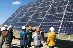 Participants during a site visit at Qapshagai solar power plant 2MW in Kazakhstan as part of the OSCE training course on renewable energy for women from Central Asia, Afghanistan, and Mongolia, 20 April 2023. (DKU/Dana Zhunissova, Mariya Gorbachyova)