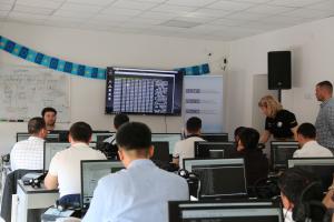 Participants of OSCE-organized training course are learning how to forensically view and read data written on a disk.   (OSCE/Umit Gubay)