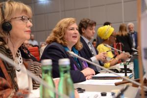 OSCE Secretary General Helga Maria Schmid, OSCE Special Representative and Co-ordinator for Combating Trafficking in Human Beings Dr. Kari Johnstone, Director of the OSCE Office for Democratic Institutions and Human Rights Matteo Meccaci and Deputy Director General of the International Organization for Migration Ugochi Daniels at the opening session of the 24th Conference of the Alliance against Trafficking in Persons in Vienna (OSCE)