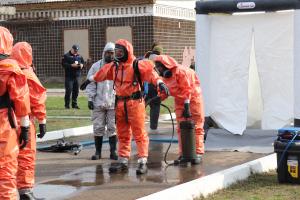 Ukrainian rescuers practice decontamination work in a chemical emergency situation at a practical exercise, organised by the OSCE Project Co-ordinator in Ukraine, Kharkiv, 13 October 2021. (OSCE/Andrii Dziubenko)