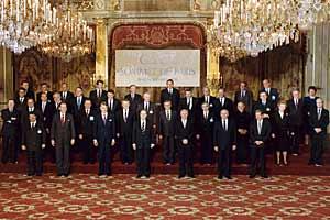 Heads of State or Government of CSCE participating States stand for a group photo at the Paris Summit, Palais de L'Elysee, 19 November 1990. (George Bush Presidential Library)