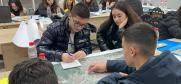 Young people work together in an OSCE-organized workshop encouraging engagement for better air quality and health, Elbasan, Albania, 5 March 2024.  (OSCE)