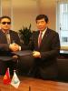 Shamil Berdaliev (l), First Deputy Chairman of the Kyrgyz State Customs Service, and Kunio Mikuriya, Secretary General of the World Customs Organization, during the signing of Memorandum of Understanding, Brussels, 19 December 2018.  (OSCE/Medet Tursaliev)