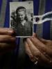 Auschwitz death camp survivor Jadwiga Bogucka (maiden name Regulska), 89, registered with camp number 86356, holds a picture of herself from 1944 in Warsaw January 12, 2015. (Reuters)