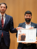 Dutch Foreign Minister Wopke Hoekstra (left) presents the 2022 Max van der Stoel Award to Tamta Mikeladze and Kamran Mammadli of the Social Justice Center, from Georgia, 24 November 2022, The Hague. (OSCE)