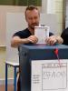 A voter casting his ballot in Sarajevo during the general elections in Bosnia and Herzegovina, 12 October 2014. (OSCE/Thomas Rymer)
