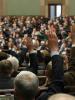 Members of parliament raise their hands during a vote at a session of the Polish parliament, the Sejm. Representatives of the Sejm met with members of parliament from OSCE participating States in South-Eastern Europe as part of a workshop on professional and ethical standards for parliamentarians, Warsaw, 5 March 2013. (Polish parliament/Krzysztof Białoskórski)