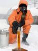 A member of the Ukrainian military takes a sample of the toxic rocket fuel component melange at the depot in Radekhiv, Ivano-Frankivsk region of Ukraine, before it is shipped for disposal, 17 February 2010. (OSCE/Leonid Kalashnyk)