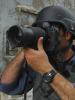 A press photojournalist in a conflict zone. (iStockphoto)