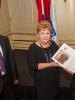 OSCE High Commissioner on National Minorities Astrid Thors presents the Max van der Stoel Award to Valentina Gritsenko, Director of human rights NGO Spravedlivost, and Utkir Dhzabbarov, Senior Lawyer of Spravedlivost, The Hague, 2 October 2014. (OSCE/Arnaud Roelofsz)