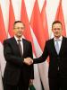 Péter Szijjártó (right), Foreign Affairs and Trade Minister of Hungary, welcomes Kairat Abdrakhmanov, OSCE High Commissioner on National Minorities, to the Annual Conference of Hungarian Ambassadors, Budapest, 26 August 2021. (OSCE)