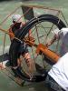 Teachers install a water wheel at Osh State University, Osh, 9 July 2011.   (OSCE/Evgeniya Postnova)