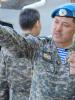 File photo: Major General Almaz Dzhumakeev, Commander of the 36th Air Storm Brigade, speaks with a representative of the German Verification Centre at a simulated inspection at a regional training event in support of the Vienna Document, Astana, 24 May 2013 (OSCE/Mikhail Assafov)