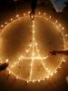People light candles during a vigil in Kathmandu November 15, 2015, following the deadly attacks in Paris. (REUTERS/Navesh Chitrakar)