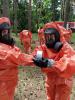 Ukrainian emergency service personnel practices response to chemical emergencies at a training organized by the OSCE in Merefa, Kharkiv region on 23 June 2021.  (Anna Predvichna/OSCE)