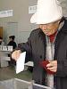 A voter in Bishkek casts his ballot during Parliamentary Elections in Kyrgyzstan, 27 February 2005. (OSCE)