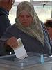 A woman votes in one of the re-runs of the 1 June 2008 parliamentary elections in the former Yugoslav Republic of Macedonia, held on 15 June. (OSCE/Drew Hyslop)