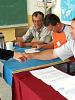 A voter is welcomed at a polling station during a referendum on the future state-status of Montenegro, in the town of Cetinje, 21 May 2006. (OSCE/Urdur Gunnarsdottir)