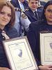 Police officers Biljana Stankovska and Cvetanka Zatovska display diplomas awarded for completing an OSCE training course in community policing in Ohrid, 18 January 2004. (OSCE)