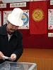 A voter casts his ballot in the town of Kant, Kyrgyzstan, during the pre-term parliamentary elections, 16 December 2007. (OSCE/Urdur Gunnarsdottir)