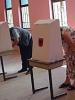 Albanian citizens marking ballots during the parliamentary 
elections, 24 June 2001. (Jens Eschenbaecher/OSCE)