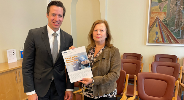 OSCE Special Representative and Co-ordinator for Combating Trafficking in Human Beings, Valiant Richey, handed over the brochure "Three Action Areas for Parliaments to Combat Trafficking in Human Beings" to the Member of Parliament of Norway Siv Mossleth, Oslo, 8 September 2022 (Julie Helmersberg Brevik) (Julie Helmersberg Brevik)