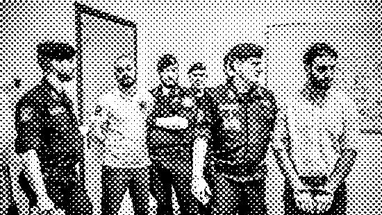 Police officers standing together in a room with two civilians, black and white photograph.